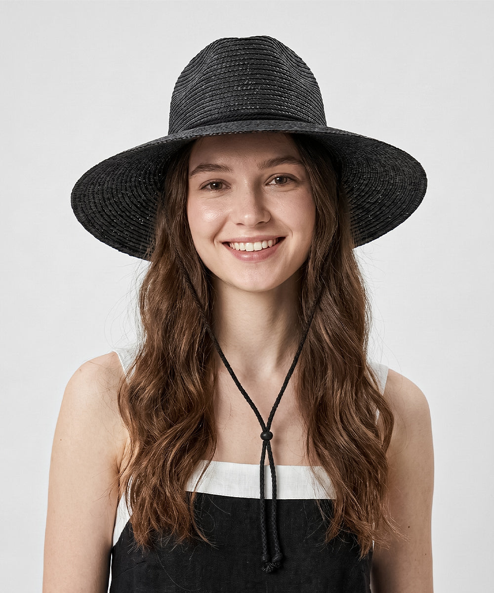 Modern streetwear active lookbook pairing an all black wide brim straw hat with casual apparel
