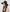 Premium boutique beachwear styling showcasing a structured matte black high crown sun hat