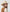 Carefree resort wear clothing lookbook highlighting a loose weave natural light ivory beach cap
