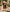 Relaxed country holiday clothing lookbook featuring a detailed brown taupe woven beach hat