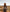 Female model styling the unisex Latitude natural felt cowboy hat for an outdoor road trip