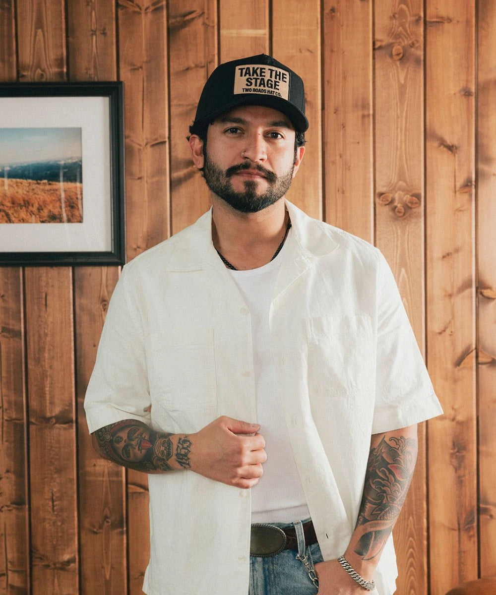 Headliner canvas trucker cap in a bold all black structured 5 panel shape