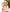 Polished resort wear outfits summer portrait accessorized with a natural ivory flat crown hat