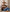 Men's rugged cowboy style clothing trends accessorized with a natural straw cowboy hat