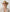 Women's statement western festival fashion trends featuring a dark brown cowboy hat